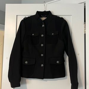 Black jacket with gorgeous details. Pockets and beautiful buttons.